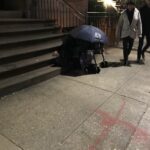 A person injecting right there on the sidewalk