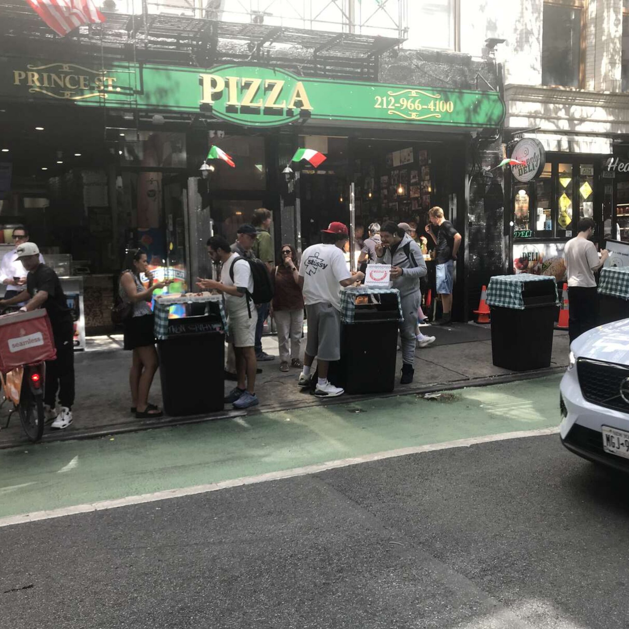 Rich people eating in garbage